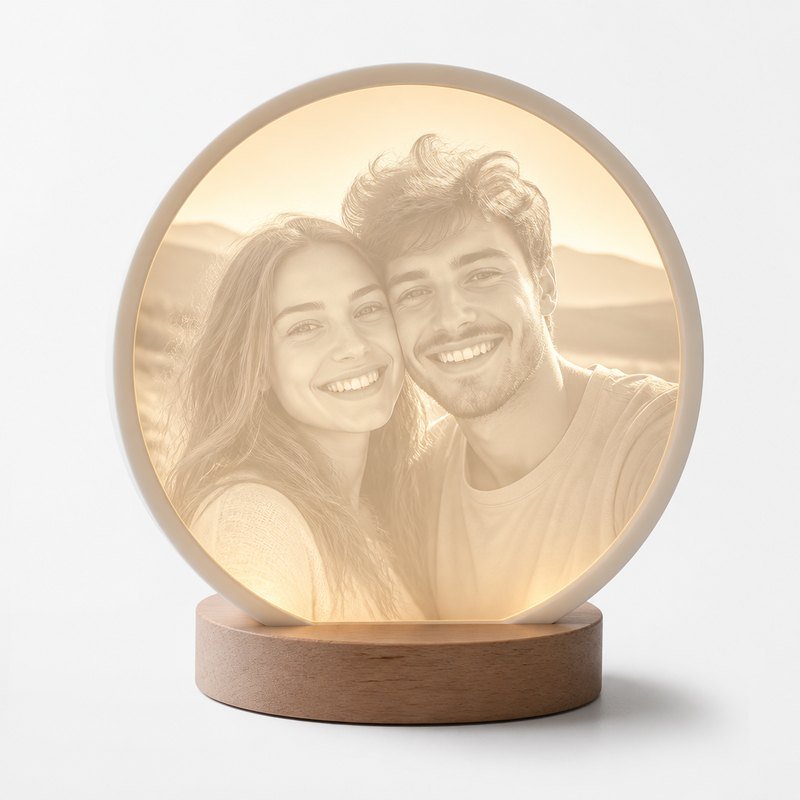 Custom lithophane lamp glowing with a couple portrait